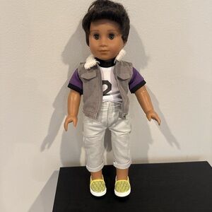 American Girl Doll Truly Me Male Doll

Includes: 
Doll
Shoes
Vest
Shirt
Pants